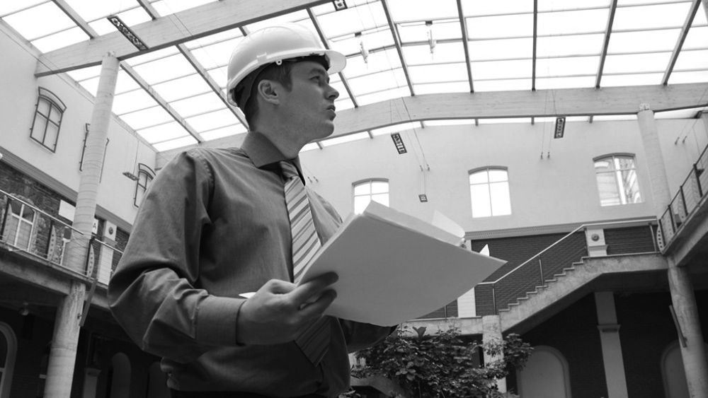 Fire engineer and inspector at work